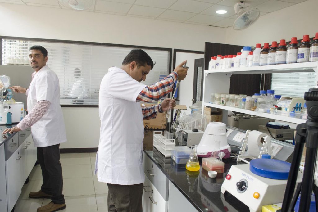 Researcher at work in the Nuvohelix R&D laboratory