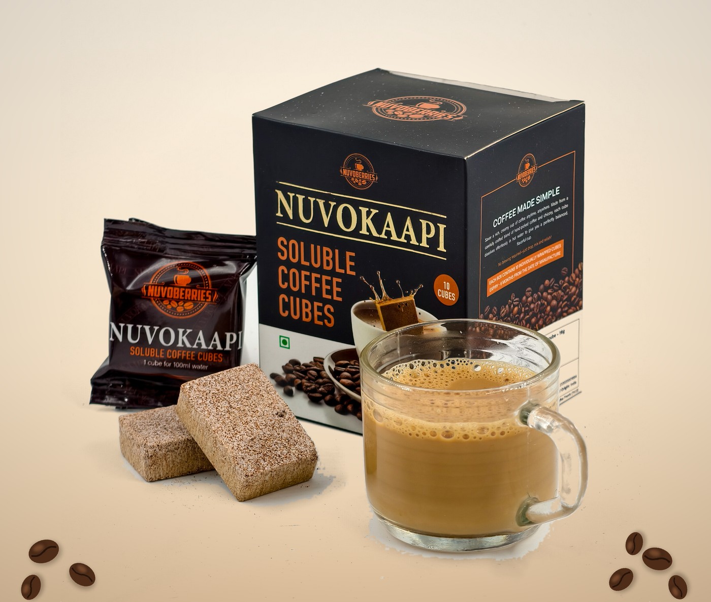 Nuvokaapi soluble coffee cubes box, sachet and cubes with a cup of coffee